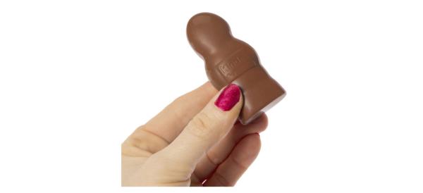 Hand holding Kinder Milk Chocolate Figures 